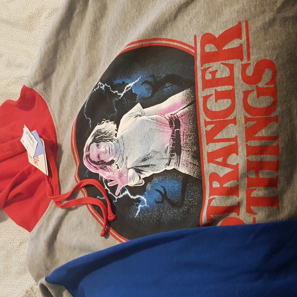 Stranger Things cropped hoodie red, gray, blue. Size Large. Never worn NWT